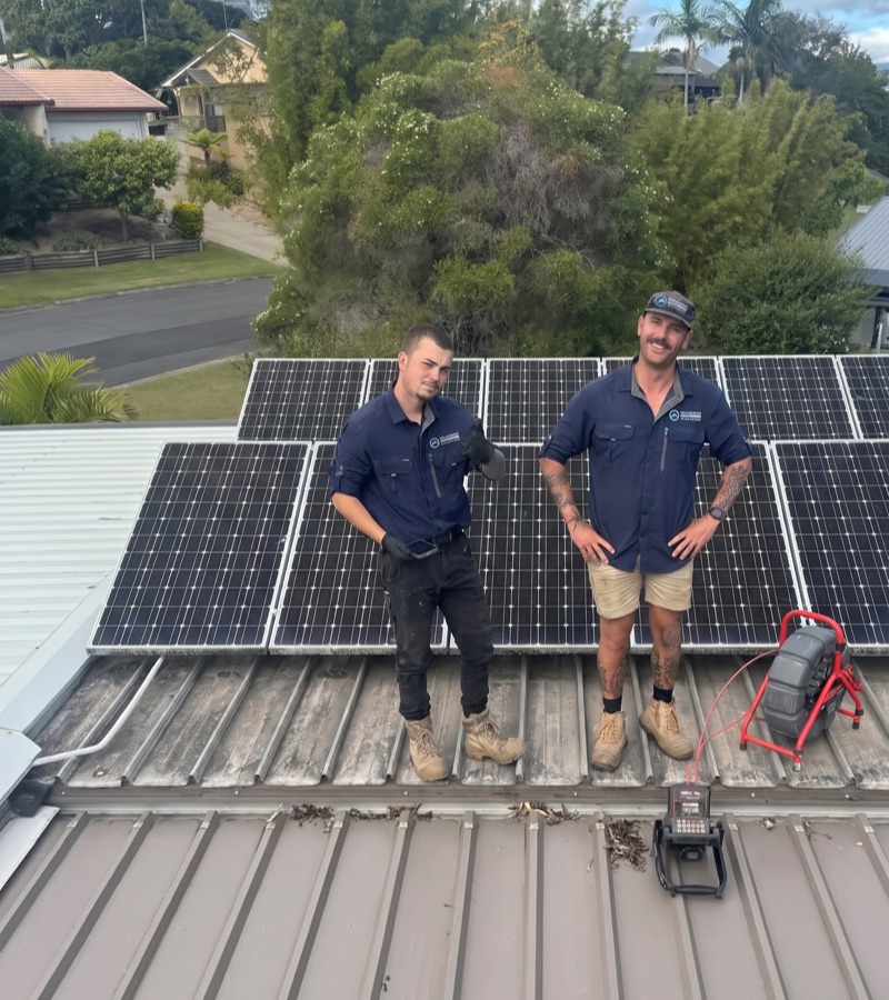 Roofing team performing an inspection on a roof